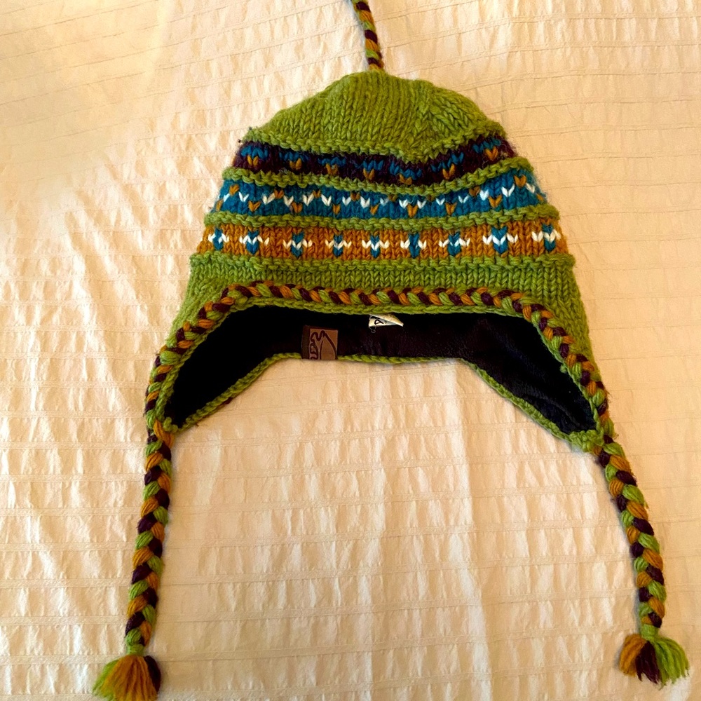 100% wool hand knitted hat with fleece liner.
